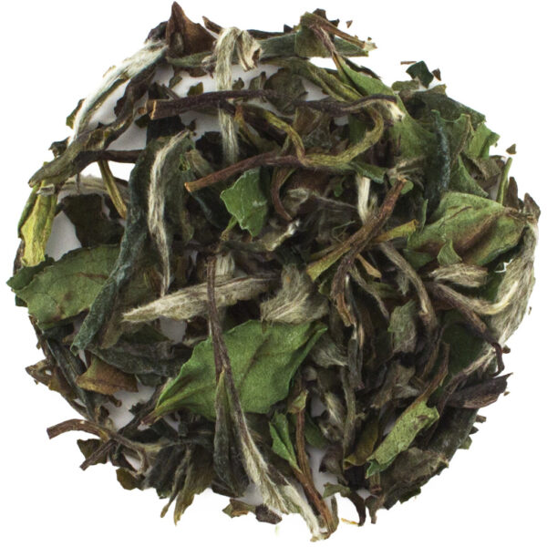 Loose leaf Organic White Peony tea displayed on white background